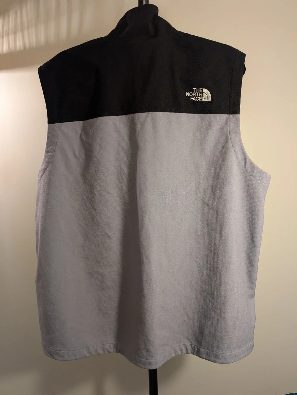 The North Face Men’s Black and Light Gray Softshell Vest